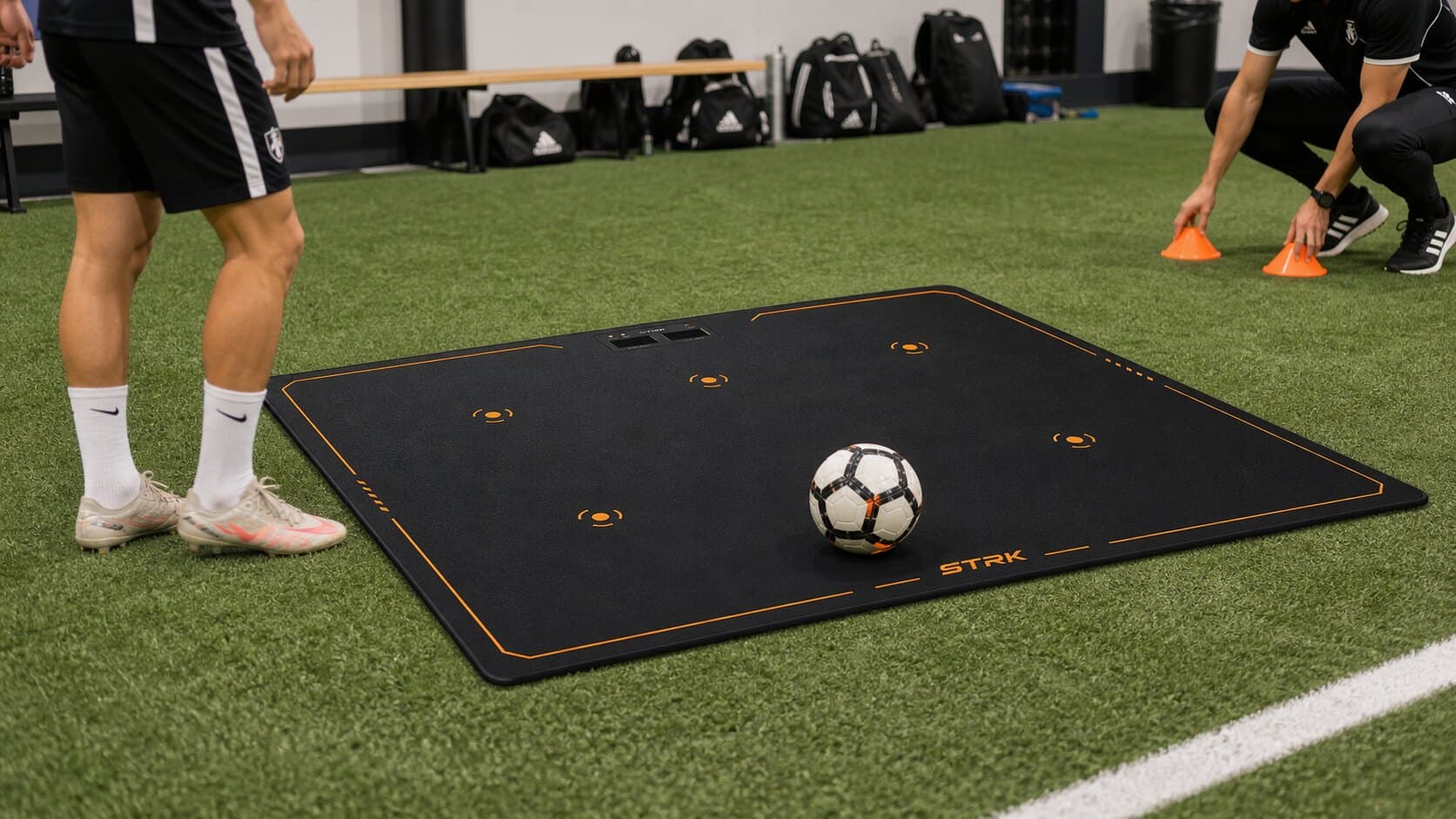 STRK smart football training equipment in an academy setting